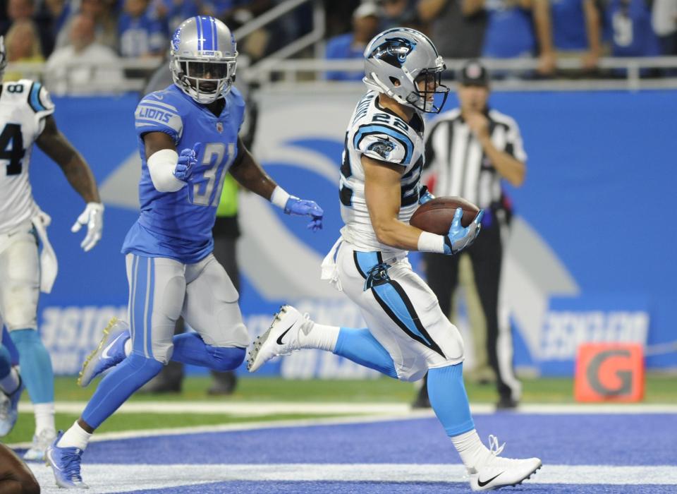 <p>Carolina Panthers running back Christian McCaffrey (22) runs into the end zone for a 6-yard touchdown during the first half of an NFL football game against the Detroit Lions, Sunday, Oct. 8, 2017, in Detroit. (AP Photo/Jose Juarez)</p>