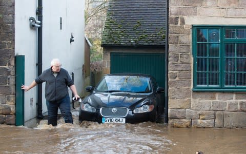 Ian Busting surveys the damage to his home in Milford  - Credit: Rod Kirkpatrick/F Stop Press