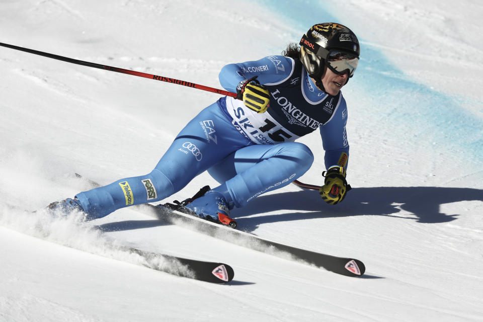 Italy's Federica Brignone speeds down the course during the super G portion of an alpine ski, women's World Championship combined race, in Meribel, France, Monday, Feb. 6, 2023. (AP Photo/Gabriele Facciotti)