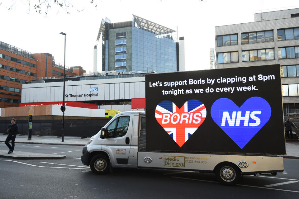 Billboard van outside St Thomas' Hospital in Central London where Prime Minister Boris Johnson is in intensive care as his coronavirus symptoms persist.