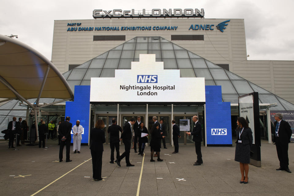 File photo dated 3/4/2020 of NHS staff gathering ahead of the opening of the NHS Nightingale Hospital at the ExCel centre in London. The ExCel centre has U-turned on charging the NHS to turn the exhibition space into a 4,000-bed field hospital.