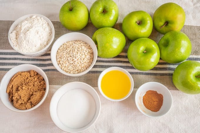 ingredients for pioneer woman apple crisp laid out on a dishcloth