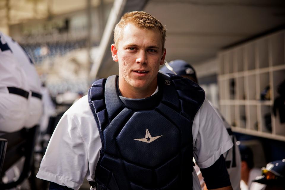 BYU catcher Collin Reuter between innings in the Cougars dugout in Miller Park in Provo. Elbow surgery derailed his baseball career for 18 months but he is back in the lineup for the Cougars in 2024. | Nate Edwards, BYU Photo