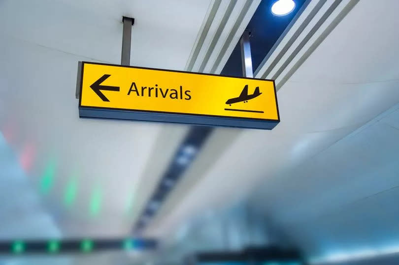 Arrivals board in airport.