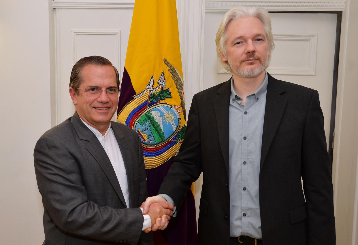 WikiLeaks founder Julian Assange (r.) shake hands with Ecuadorian Foreign Minister Ricardo Patino after a press conference, where he confirmed he "will be leaving the embassy soon", in the Ecuadorian Embassy on August 18, 2014 in London, England. Assange has been living in the embassy since June 2012 in an attempt to avoid extradition to Sweden where he faces allegations of sexual assault.