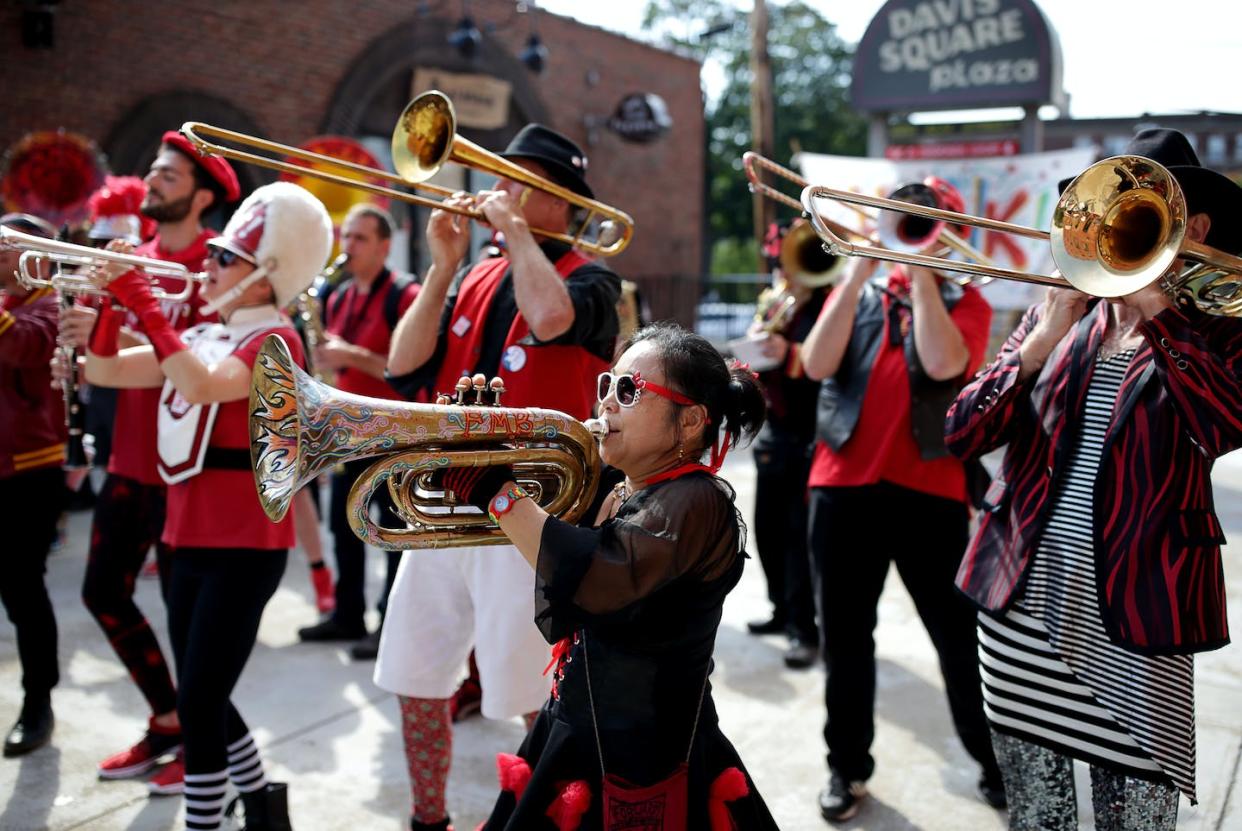 Members of the Forward Marching Band perform at a HONK! Festival in Somerville, Massachusetts, on Oct. 7, 2017. <a href="https://www.gettyimages.com/detail/news-photo/members-of-the-forward-marching-band-perform-at-honk-news-photo/859831476" rel="nofollow noopener" target="_blank" data-ylk="slk:Jonathan Wiggs/The Boston Globe via Getty Images;elm:context_link;itc:0;sec:content-canvas" class="link ">Jonathan Wiggs/The Boston Globe via Getty Images</a>