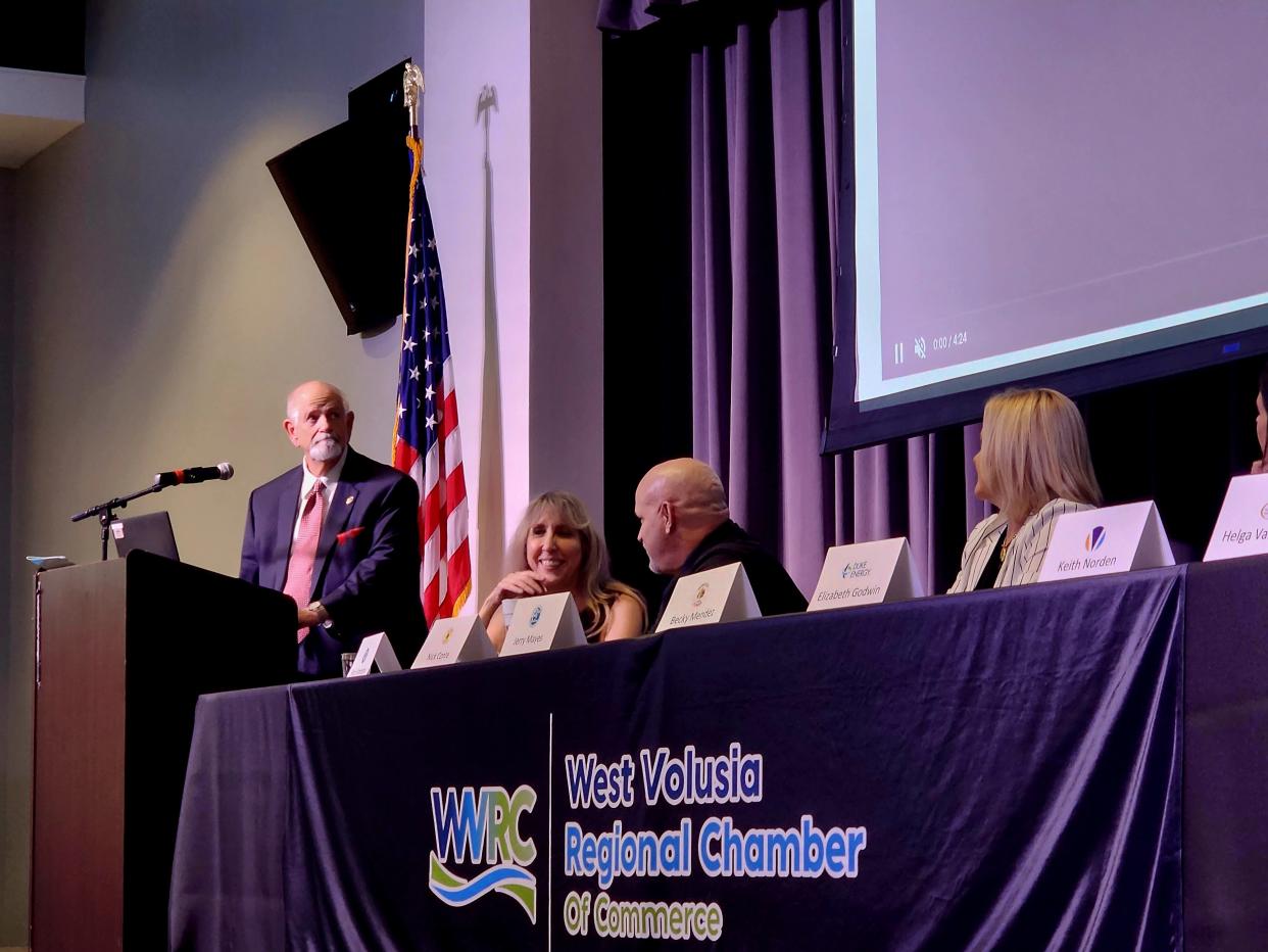 Jerry Mayes, who retires soon from his role as Deltona's economic development and ecological tourism sustainability manager, prepares to begin his presentation on Volusia County's biggest city during the West Volusia Regional Chamber of Commerce's economic forum on Wednesday, April 5.