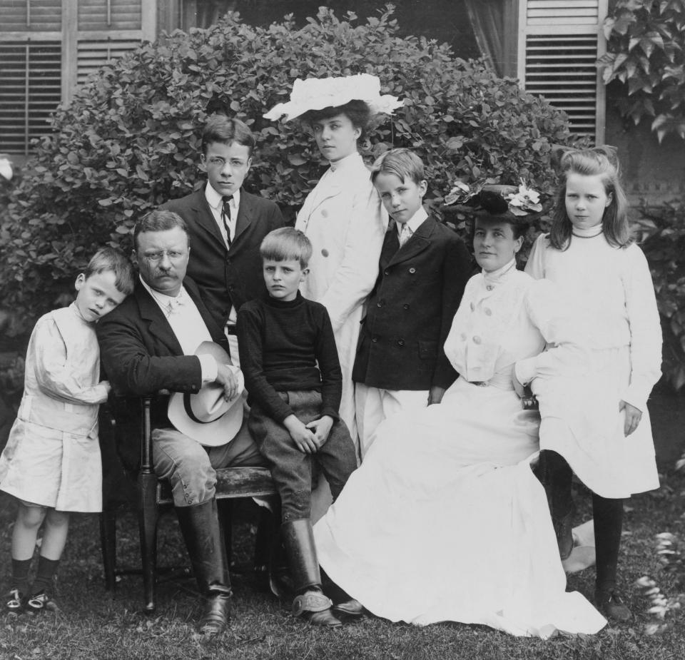 President Theodore Roosevelt and first lady Edith Roosevelt take a 1903 portrait in New York with their children, from left, Quentin, Theodore Jr., Archibald, Alice, Kermit and Ethel.