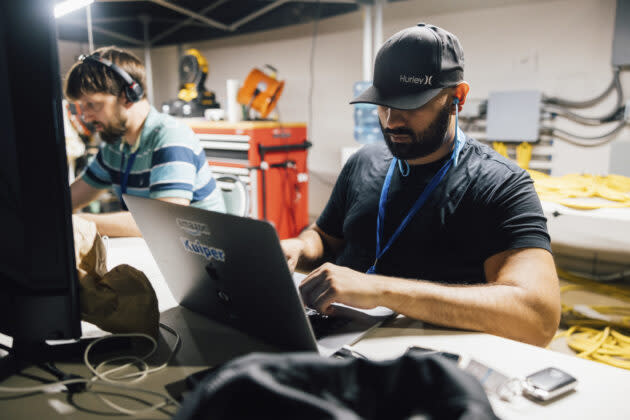 Engineers in McAllen, Texas, work on laptops during Project Kuiper’s satellite network test. (Amazon Photo)