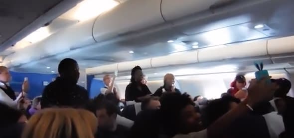 Gospel choir surprises passengers with performance on plane 