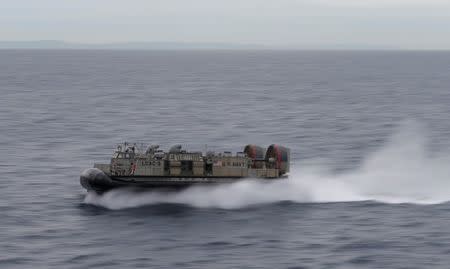 A U.S. Navy Landing Craft Air Cushion (LCAC) heads across the Pacific Ocean towards Sydney, Australia, during events marking the start of Talisman Saber 2017, a biennial joint military exercise between the United States and Australia, July 29, 2017. REUTERS/Jason Reed