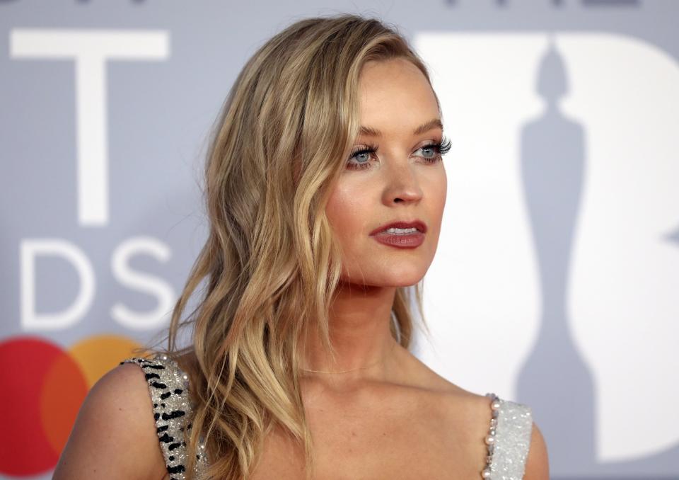 Laura Whitmore poses for photographers upon arrival at Brit Awards 2020 in London, Tuesday, Feb. 18, 2020.(Photo by Vianney Le Caer/Invision/AP)