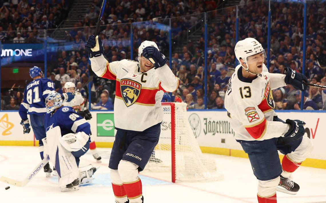 Apr 25, 2024; Tampa, Florida, USA; Florida Panthers center Sam Reinhart (13) is congratulated by left wing Matthew Tkachuk (19) after scoring against the Tampa Bay Lightning during the second period in game three of the first round of the 2024 Stanley Cup Playoffs at Amalie Arena. Mandatory Credit: Kim Klement Neitzel-USA TODAY Sports