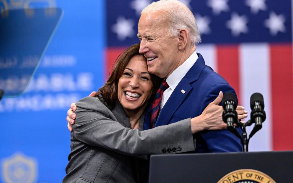 Kamala Harris embraces President Joe Biden after a speech on healthcare in Raleigh, North Carolina