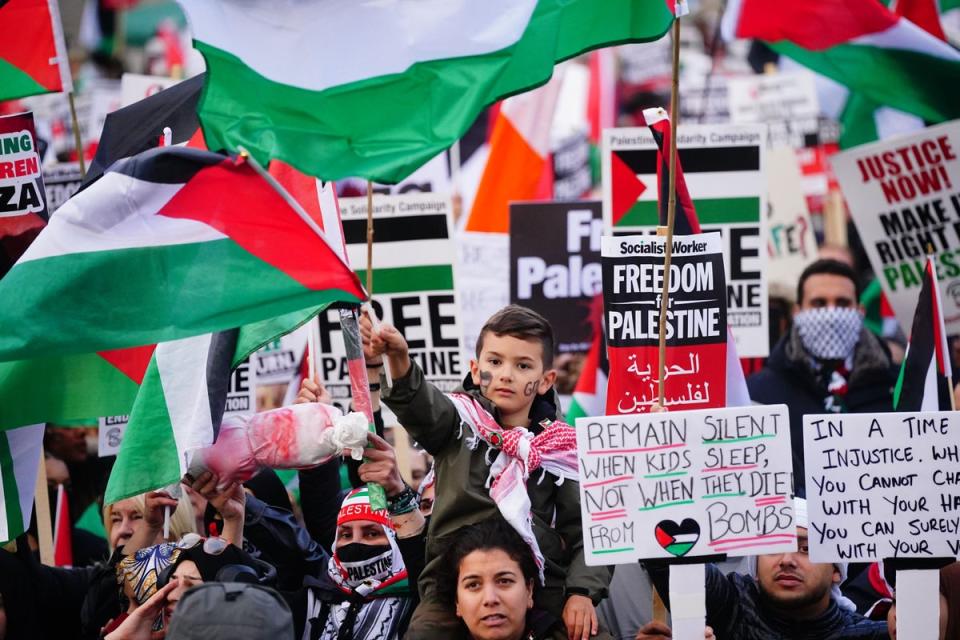 People at a rally in Trafalgar Square, London, during Stop the War coalition’s call for a Palestine ceasefire. (PA Wire)