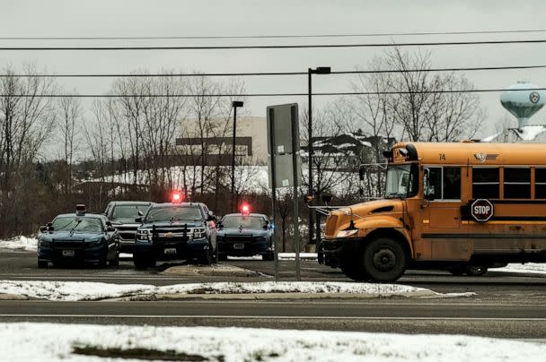 PHOTO: In this Nov. 30, 2021, file photo, police cars restrict access to Oxford High School following a shooting, in Oxford, Mich. (Matthew Hatcher/Getty Images, FILE)