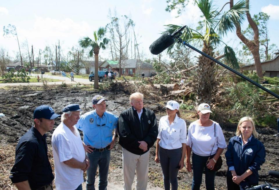 US President Donald Trump and First Lady Melania Trump tour damage from Hurricane Michael (AFP/Getty Images)