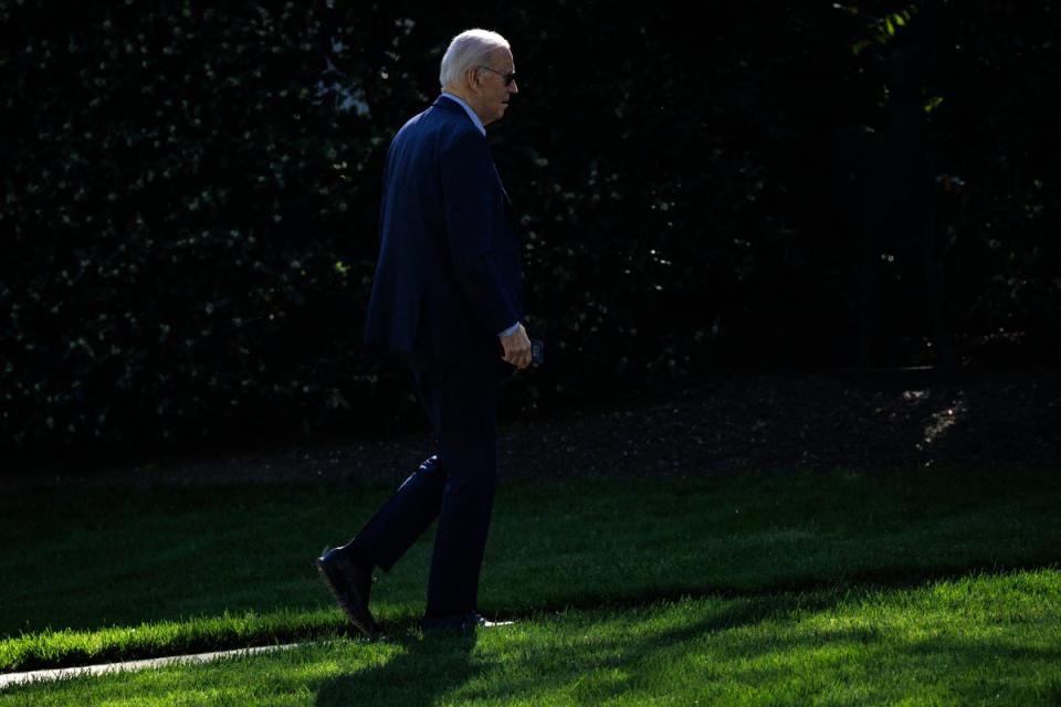 President Joe Biden, pictured arriving at the White House on 13 April 2024, cut his trip to Delaware short (AFP via Getty Images)