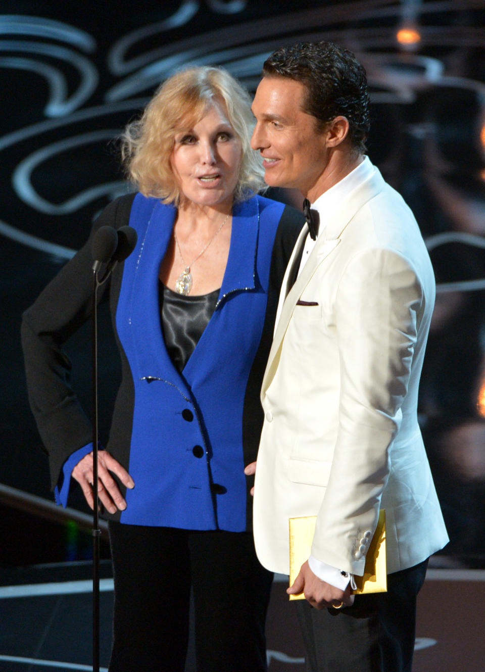 FILE - In this March 2, 2014 file photo, Kim Novak, left, and Matthew McConaughey speak during the Oscars at the Dolby Theatre in Los Angeles. Novak said Thursday, April 17, 2014, that criticism of how she looked as a presenter at the Oscars last month amounted to hurtful bullying, which she condemned in an open letter and interview. (Photo by John Shearer/Invision/AP, file)