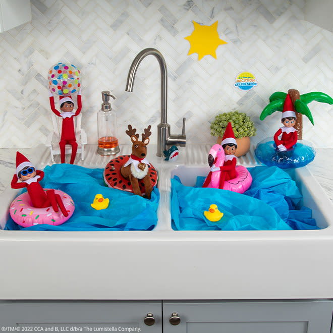 Elf on the Shelf North Pole pool party scene. 