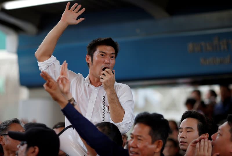 Juangroongruangkit of Thailand's progressive Future Forward Party talks to his supporters during an unauthorized flash mob rally in Bangok