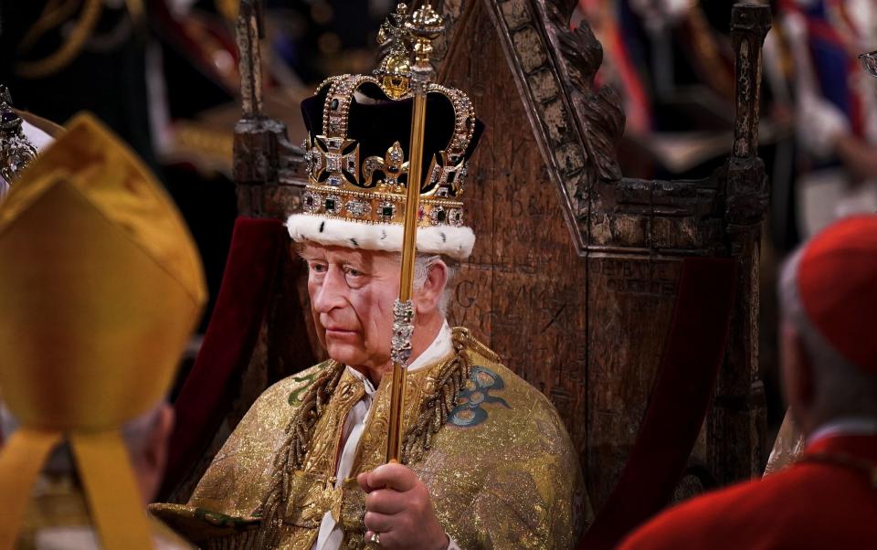 The King wears St Edward's Crown during his coronation in Westminster Abbey