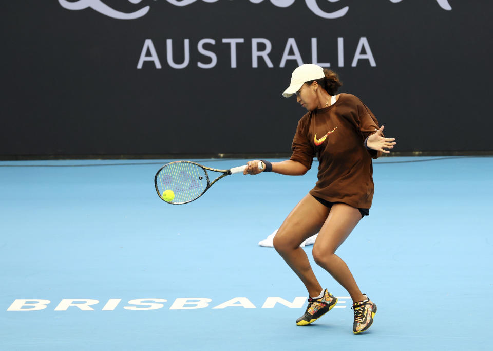 Naomi Osaka of Japan practices during a training session ahead of the Brisbane International tennis tournament in Brisbane, Australia, Wednesday, Dec. 27, 2023. (AP Photo/Tertius Pickard)