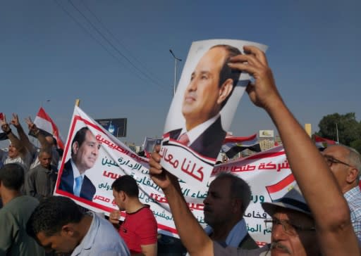 Supporters of Egyptian President Abdel Fattah al-Sisi rally near the Unknown Soldier Memorial in the eastern Nasr City