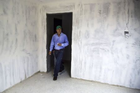 Lara state governor Henri Falcon leaves a building in Barquisimeto, Venezuela June 11, 2015. REUTERS/Marco Bello