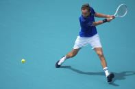 Daniil Medvedev runs to play a ball from Dominik Koepfer, of Germany, in their men's singles fourth round match at the Miami Open tennis tournament, Tuesday, March 26, 2024, in Miami Gardens, Fla. (AP Photo/Rebecca Blackwell)