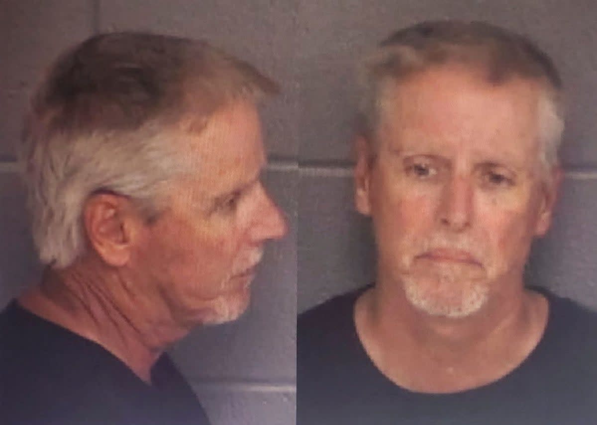 Colin Gray, 54, father of 14-year-old suspected Apalachee High School shooter Colt Gray, poses for police booking photos released September 5 (via REUTERS)