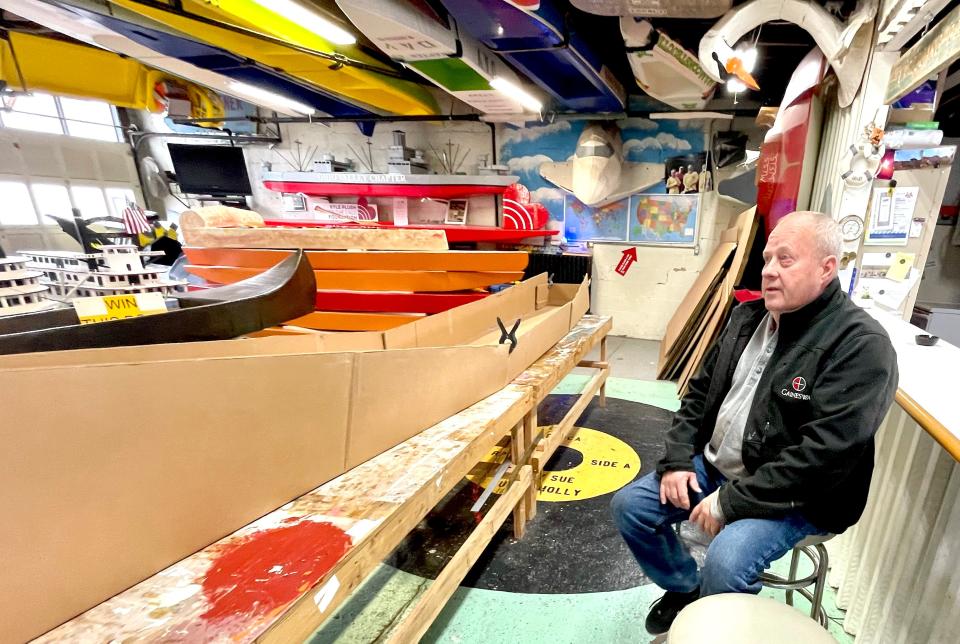 Cardboard Boat Museum co-founder Tom Lemon talks about a boat under construction in the museum.