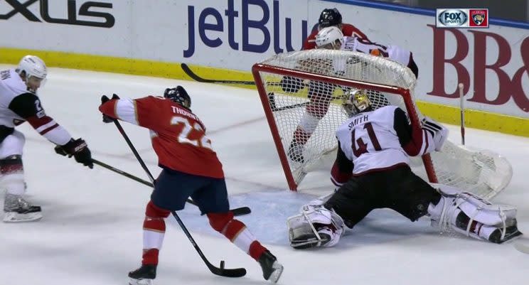 The net comes crashing down on Mike Smith.