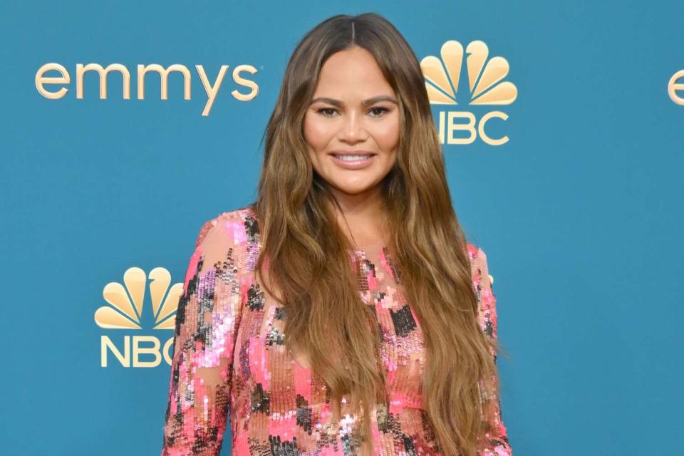 <p>Michael Buckner/Variety via Getty</p> Chrissy Teigen at the 2022 Emmys