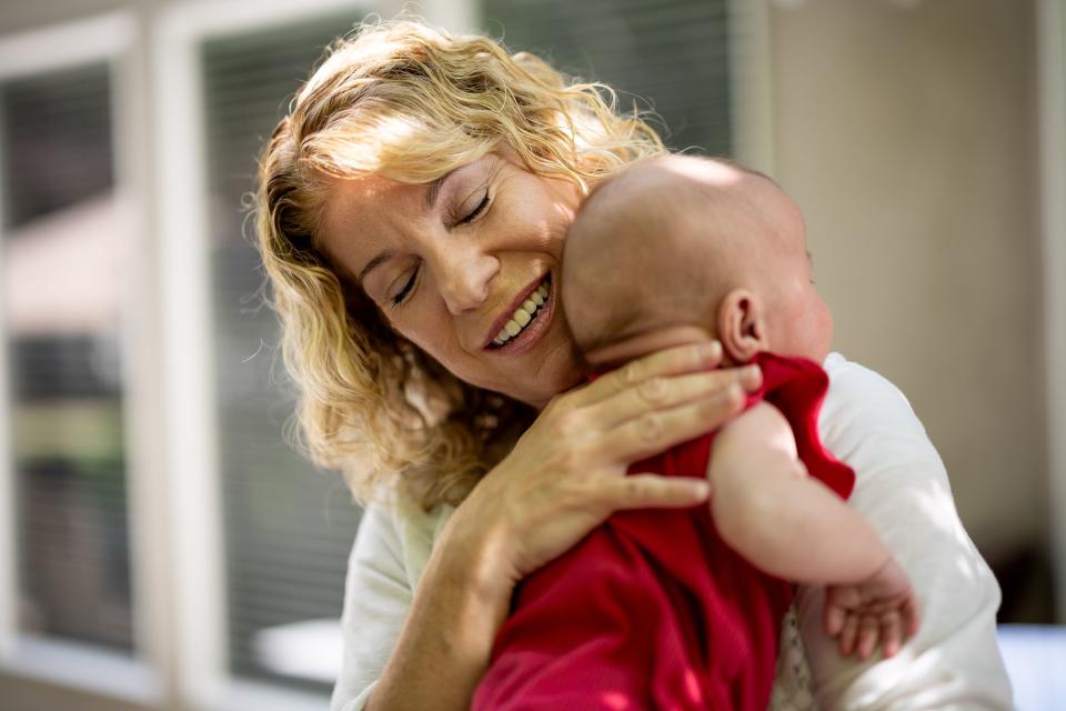 Cindy Davis holds her 9-week-old granddaughter Indy while babysitting her at home in Cedar Hills on Tuesday, Aug. 15, 2023. | Spenser Heaps, Deseret News
