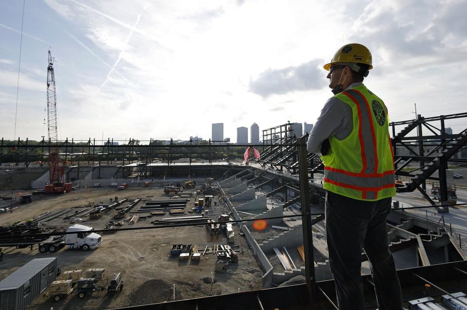 Columbus Crew SC President and General Manager Tim Bezbatchenko takes a second to look at the construction progress of the new stadium site during a tour in downtown Columbus on August 12, 2020.