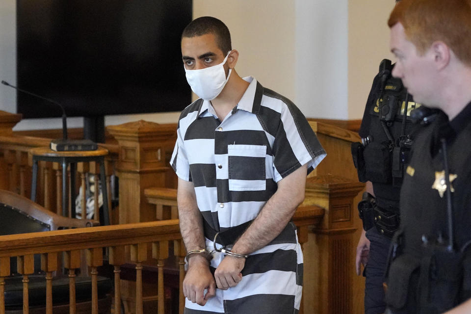 Hadi Matar, 24, center, arrives for an arraignment in the Chautauqua County Courthouse in Mayville, NY., Saturday, Aug. 13, 2022. (AP Photo/Gene J. Puskar)