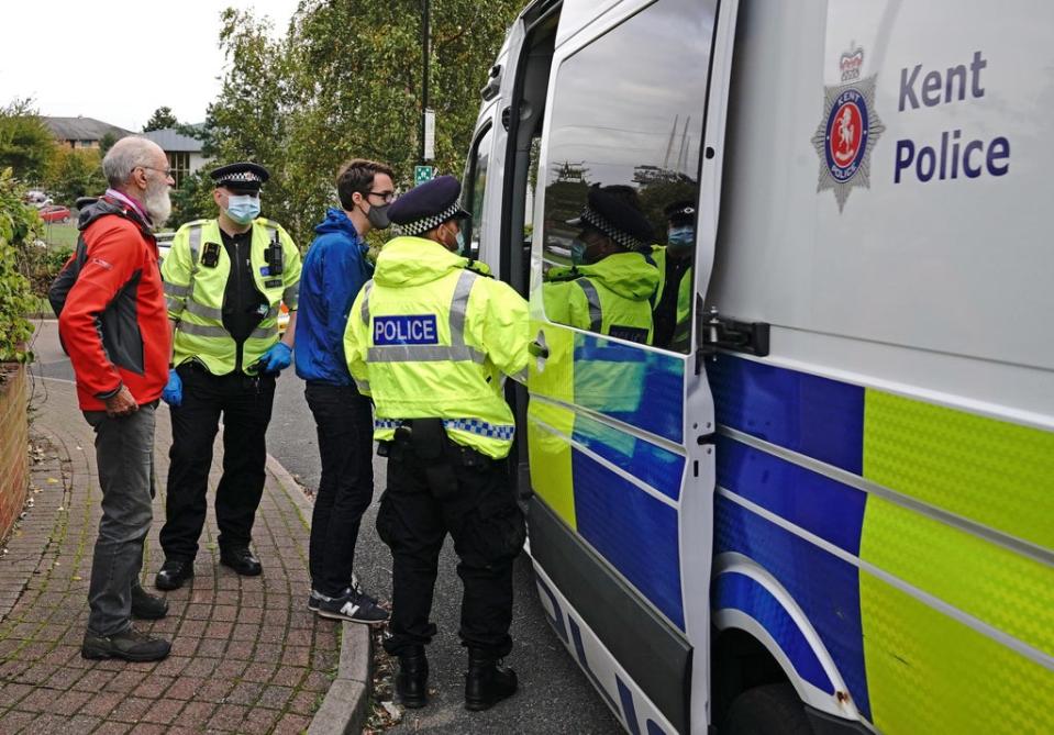 Protesters from Insulate Britain including Tony Hill (left) are arrested by police in the car park of the DoubleTree by Hilton Hotel Dartford Bridge in Dartford (Jonathan Brady/PA) (PA Wire)