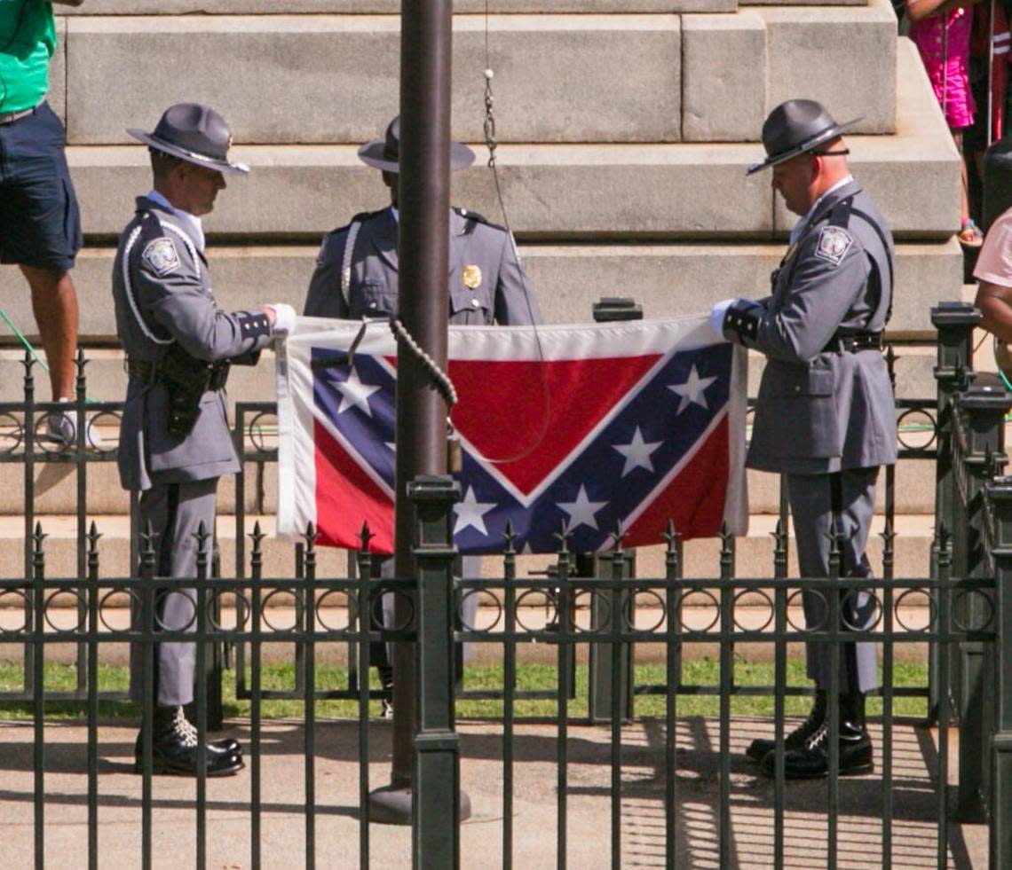 The South Carolina Highway Patrol Honor Guard removed the Confederate Battle Flag from the State House grounds during a ceremony on July 10, 2015.