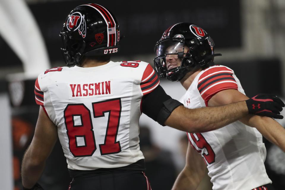 Utah tight end Thomas Yassmin (87) celebrates his touchdown against Oregon State with Luca Caldarella (19) during the second half of an NCAA college football game Friday, Sept. 29, 2023, in Corvallis, Ore. Oregon State won 21-7. | Amanda Loman, AP