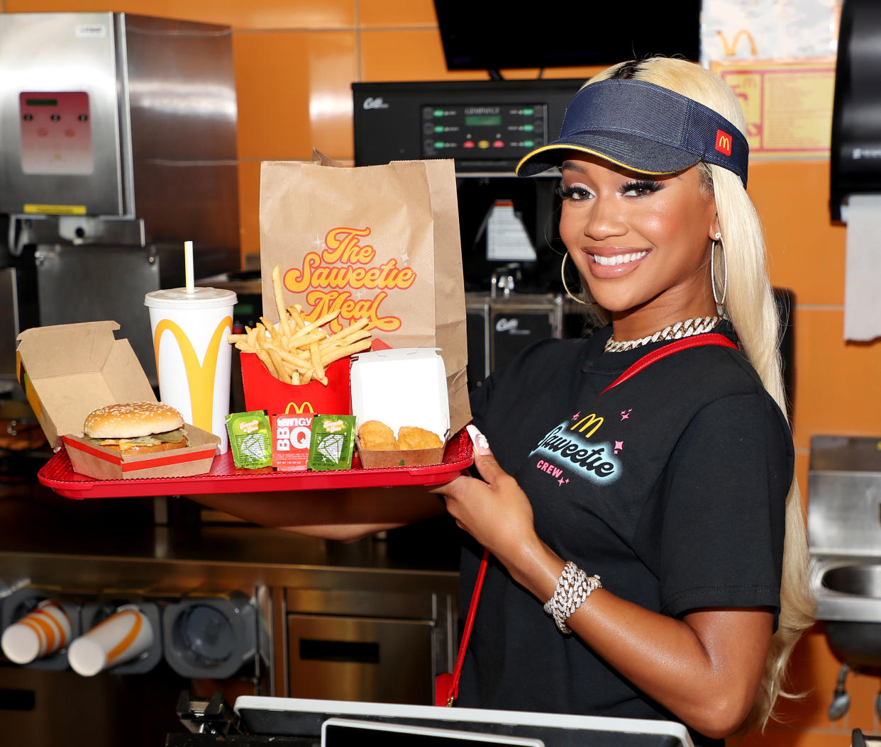 Saweetie celebrates the launch of her signature order at McDonald's.