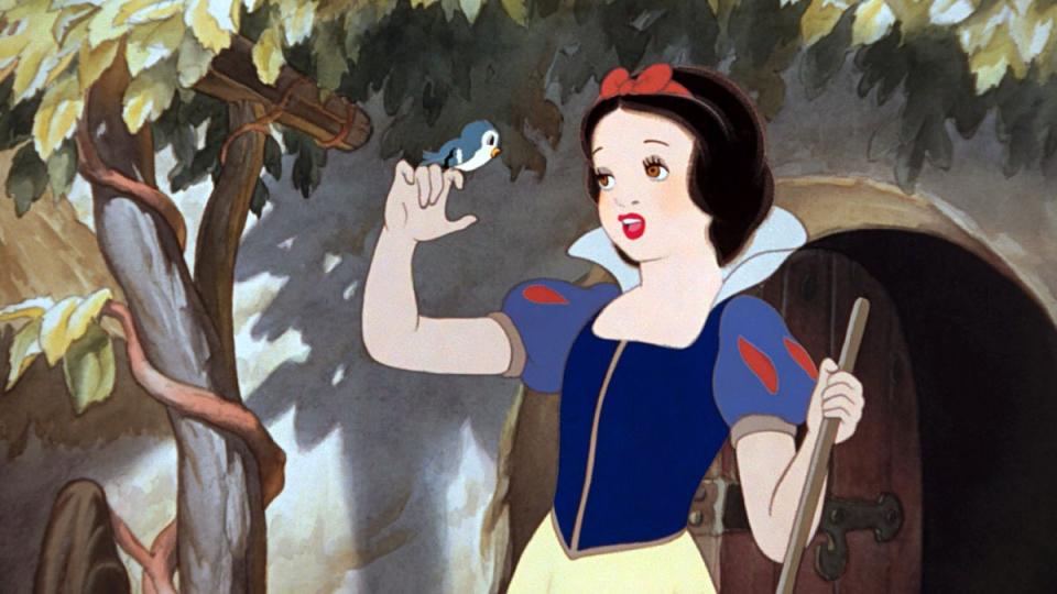 Snow White sings to a bird