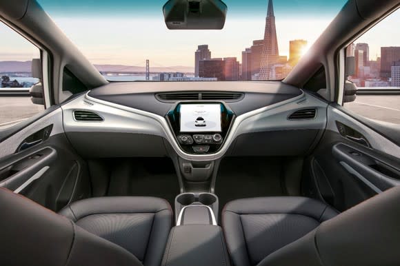 Interior of Cruise autonomous vehicle with no steering wheel.