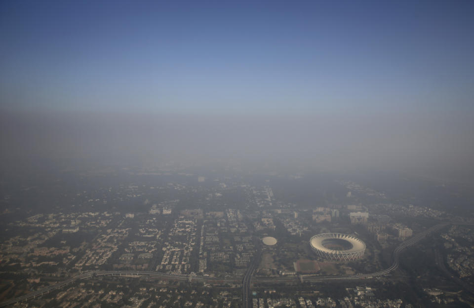 Smog envelopes the horizon in New Delhi, India, Wednesday, Nov. 7, 2018. With air quality reduced to "very severe" in the Indian capital region, authorities are bracing for a major Hindu festival featuring massive fireworks that threatens to cloak New Delhi with more toxic smog and dust. (AP Photo/Altaf Qadri)