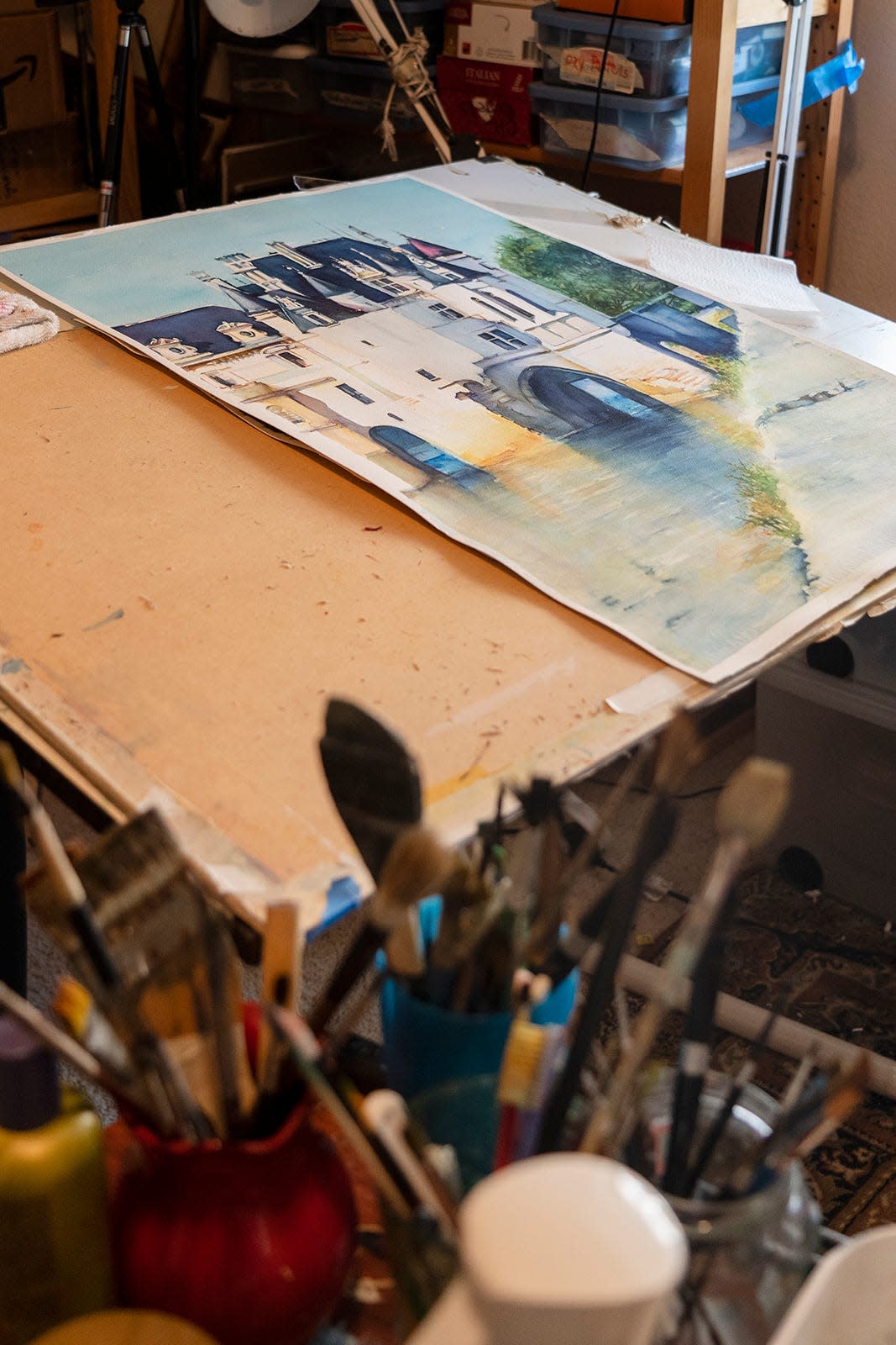 A watercolor is seen in progress in Kathleen Stafford's art studio in her home. She and her diplomat husband lived in Mauritania, Nigeria, Iraq, Ivory Coast, Sudan, Gambia, Tunisia, Algeria, Kuwait, Egypt, Iran and Italy.