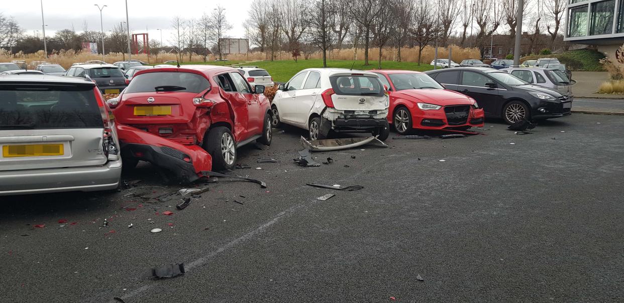 PIC BY MERCURY PRESS (PICTURED the trail of destruction left by a Range Rover after it drove into 4 parked cars at a gym in Garston, Liverpool) Mustâve been leg day! Gymgoers were shocked after a bungling female driver in a Range Rover destroyed four parked cars â before driving off. These dramatic scenes show the aftermath at 24/7 Fitness in Garston, Liverpool, this morning [THURS] after four cars were totalled by the clumsy motorist, believed to be in her early to mid-twenties. An eyewitness, who asked not to be named, spotted the carnage after finishing her workout. The woman said: âI walked out of the gym and heard a car alarm going off (MERCURY PRESS)