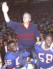 Bill Parcells is carried off the field by linebackers Lawrence Taylor and Carl Banks (Yahoo Sports)