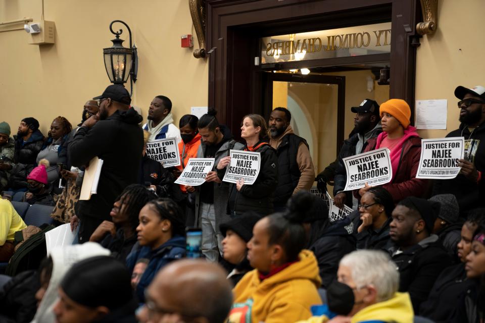 People calling for justice for Najee Seabrooks look on during a Paterson City Council meeting on Tuesday, March 14, 2023. Seabrooks, a member of the violence intervention group the Paterson Healing Collective, was fatally shot by Paterson police after a standoff while he was barricaded inside his home.