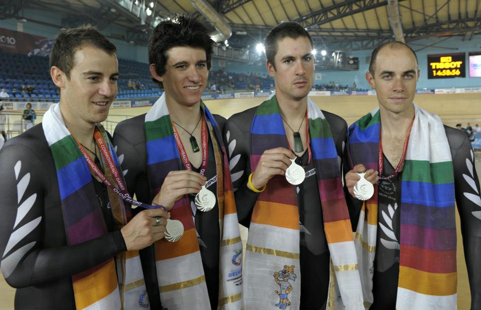 New Zealand cyclists pose with their med