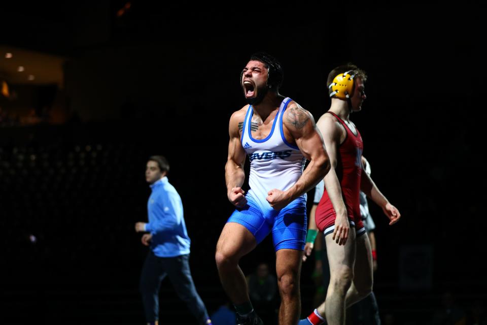 Iowa Western’s Fabian Padilla celebrates a victory over North Idaho’s Benjamen Mitchell in the 157-pound championship finals of the 2023 NJCAA Wrestling Championships at the Mid-America Center in Council Bluffs, Iowa on March 4, 2023. Padilla is a native of Carlsbad.